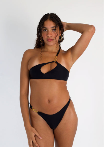 Leah Loves Ivy Asymmetric Bikini Top in Black with Gold Hardware - Front
