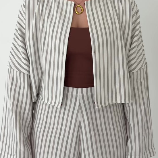Woman showing a jackt being worn in multiple ways